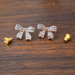 Swarovski Crystal Bow Earrings • Gold Tone • Sparkly Ribbon Design • NWT
